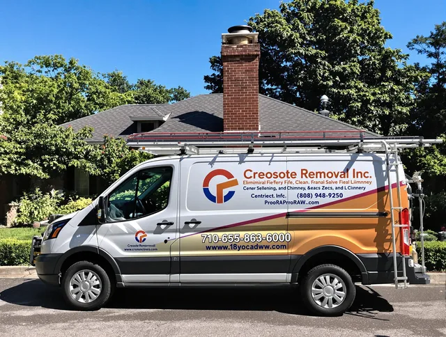 Carver Chimney Sweep technician removing creosote safely in Carver, MA